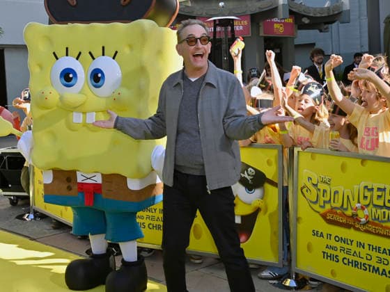 Tom Kenny, the voice of SpongeBob participates in a hand and footprint ceremony immortalizing SpongeBob in the forecourt of the TCL Chinese Theatre (formerly Grauman s) in the Hollywood section of Los Angeles on Tuesday, December 16, 2025.  LAP20251216421 JIMxRUYMEN