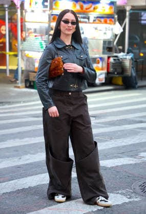 Lola Tung out in New York Actress Lola Tung is doing a photo op front of the Foot Locker store in Times Square, New York on December 16, 2025. Photo by Dylan Travis ABACAPRESSCOM New York NY  Copyright: xDylanxTravis ABACAx