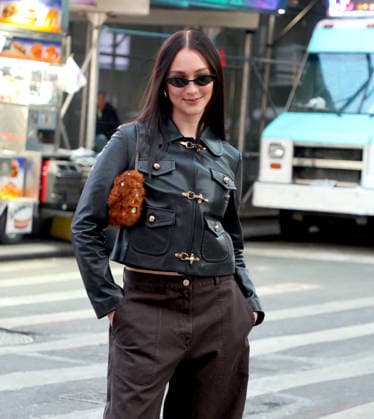 Lola Tung out in New York Actress Lola Tung is doing a photo op front of the Foot Locker store in Times Square, New York on December 16, 2025. Photo by Dylan Travis ABACAPRESSCOM New York NY  Copyright: xDylanxTravis ABACAx