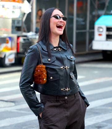 Lola Tung out in New York Actress Lola Tung is doing a photo op front of the Foot Locker store in Times Square, New York on December 16, 2025. Photo by Dylan Travis ABACAPRESSCOM New York NY  Copyright: xDylanxTravis ABACAx