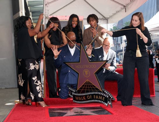 Angelique Jackson, Angela Bassett, Courtney B. Vance, Bronwyn Golden Vance, John Landgraf and Slater Josiah Vance attend an unveiling ceremony honoring Courtney B. Vance with the 2,831st star on the Hollywood Walk of Fame in Los Angeles on Tuesday, December 16, 2025.  LAP20251216830 GREGxGRUDT