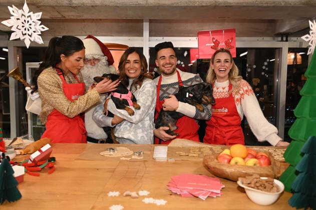 Jana Azizi, Jana Ina Zarrella with dog Mimi, Stefano Zarrella with dog Rocky and Sandra Kuhn, l-r, pose at the presentation of dog cookies alla Stefano Zarrella un Biscotto per Naturale in cooperation with the premium dog food manufacturer Animonda