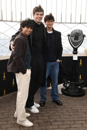 NEW YORK, NY- DECEMBER 17: Aryan Simhadri, Daniel Diemer and Charlie Bushnell pictured at The Empire State Building celebrating season 2 of Percy Jackson and the Olympians on Disney+ and Hulu on December 17, 2025 in New York City. Copyright: xMediaPunchx