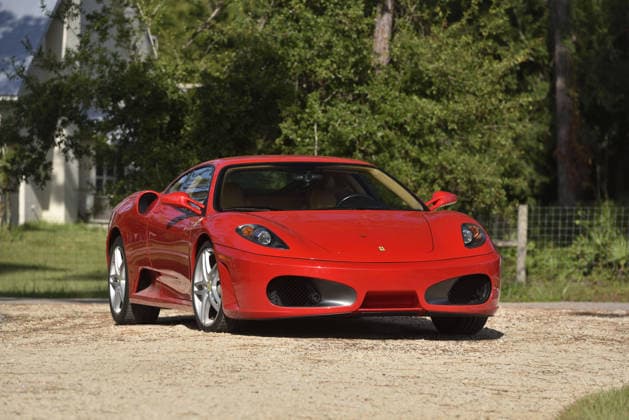 Donald Trump’s old Ferrari selling for £750,000 Story From Jam Press (Donald Trump Ferrari) Pictured: Donald Trump’s 2007 Ferrari F430 F1. Donald Trump’s old Ferrari selling for £750,000 Donald Trump’s old Ferrari is being sold for £750,000. The US President got the classic red F430 F1 brand new in 2007. It was ten years before he was elected to the White House. He was hosting the US version of The Apprentice at the time. It would have set him back about £120,000 when he got it 18 years ago. The 196mph supercar was delivered to the now 79-year-old Trump Tower in New York City. The car is being sold with Trump’s distinctive signature on the paperwork. The Ferrari boasts a 4.3 litre V8 engine and has only done 9,493 miles. The car  Copyright: xJamxPress PhotosxCourtesyxofxMecumxAuctions,xInc.