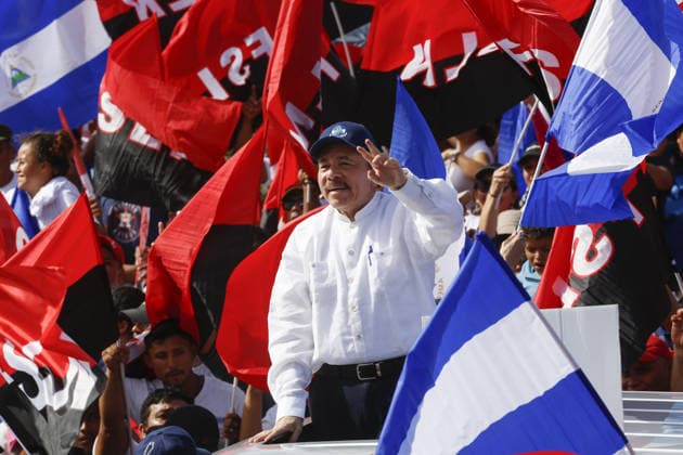 Commemoration of the 39th Anniversary of the Sandinista Revolution MANAGUA, NICARAGUA - JULY 20: Nicaraguan President Daniel Ortega (C) waves at supporters during the commemoration of the 39th Anniversary of the Sandinista Revolution at La Fe square in Managua on July 19, 2018. Ortega blamed satanical criminals, Catholic bishops and the US for a wave of unrest he has violently sought to extinguish, as he marked on Thursday the 39th anniversary of the leftwing revolution that first brought him to power. Managua Nicaragua. Editorial use only. Please get in touch for any other usage.  Copyright: x2025xAnadoluxStringerx