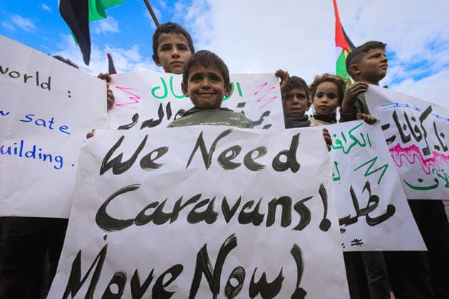 Vigil Organized By Displaced Palestinians - Jabalia A vigil organized by displaced Palestinians in Jabalia, northern Gaza Strip, demanding the entry of residential caravans and the acceleration of Gaza’s reconstruction, on December 20, 2025. Photo by Ramez Habboub ABACAPRESS.COM Jabalia Northern Gaza Strip Palestine  Copyright: xHabboubxRamez ABACAx