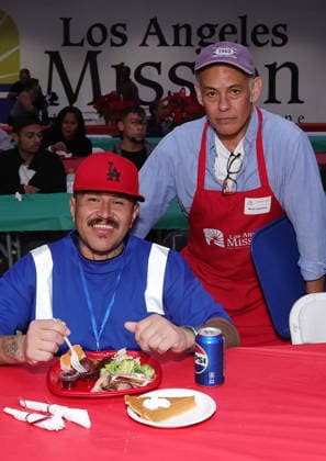 19 December 2025 - Los Angeles, California - Mark Damon Espinoza Hope The Mission And Los Angeles Mission Host Annual Christmas Celebration On Skid Row held at Los Angeles Mission in Los Angeles. Los Angeles USA - ZUMAa123 20251219_zaa_a123_159 Copyright: xADx