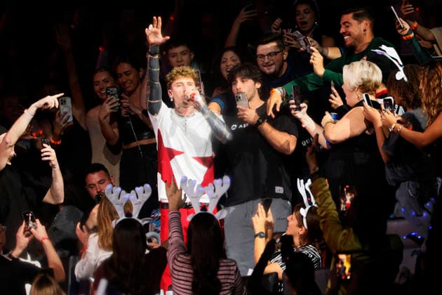 MGK performs at the Y100 s iHeartRadio Jingle Ball 2025 show at the Kaseya Center in Miami, Florida, on Saturday, December 20, 2025.  MIA20251220137 GARYxIxROTHSTEIN