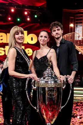 December 21, 2025, Rome, Rome, Italy: Dancing with the Stars television show, the finale. Pictured: Milly Carlucci with Andrea Delogu and Nikita Perotti, the winners. Rome, Italy 20 December 2025 Rome Italy  - ZUMAa289 20251221_zia_a289_020 Copyright: xCristianoxMinichiellox