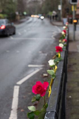 Roses adorn the side of the road ahead of the funeral procession of Gary Mani Mounfield, Bass Player in the Stone Roses and Primal Scream, in Heaton Moor, Stockport on 22 December 2025. 22 12 2025 Stockport Greater Manchester England Heaton Moor  Copyright: xMattxWilkinsonx