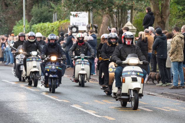 Scooter riders lead the funeral procession of Gary Mani Mounfield, Bass Player in the Stone Roses and Primal Scream, makes its way through Heaton Moor, Stockport on 22 December 2025. 22 12 2025 Stockport Greater Manchester England Heaton Moor  Copyright: xMattxWilkinsonx