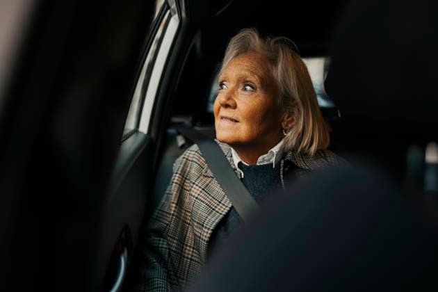 Senior woman looking out through window while sitting in car Sweden, Gothenburg, model released Copyright: xMaskotx , MA122458 MA122458