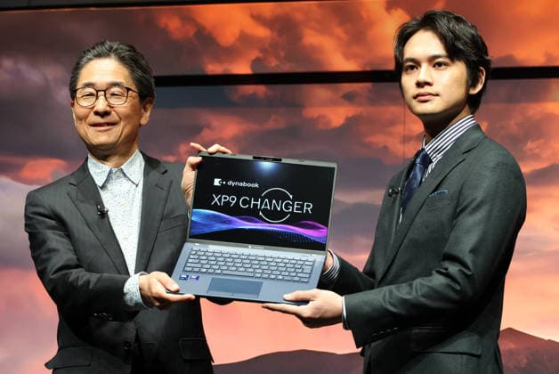 December 23, 2025, Tokyo, Japan - Japanese actor Takumi Kitamura (R) and Kiyofumi Kakudo (L), president of Sharp s computer Dynabook display the latest notebook computer as Kitamura is named as the brand ambassador of the Dynabook of Sharp s notebook computer in Tokyo on Tuesday, December 23, 2025. (photo by Yoshio Tsunoda AFLO)  aflo_314375158