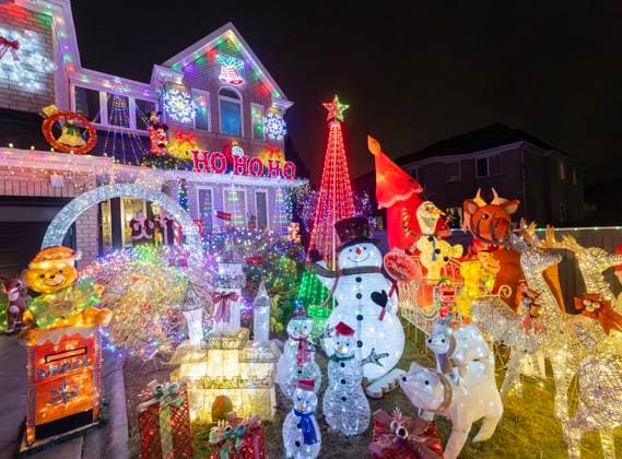 (251223) -- MISSISSAUGA, Dec. 23, 2025 -- Christmas-themed lights and decorations are pictured outside a house in Mississauga, Ontario, Canada, Dec. 22, 2025. (Photo by Xinhua) CANADA-MISSISSAUGA-CHRISTMAS DECORATIONS ZouxZheng 