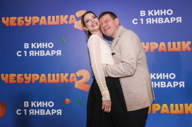 RUSSIA, MOSCOW - DECEMBER 24, 2025: Actors Maria Lugovaya and Sergei Lavygin pose on the red carpet during the premiere of the family comedy Cheburashka 2 by Dmitry Dyachenko at the KARO 11 Oktyabr cinema on Novy Arbat Street (New Arbat Avenue). Valery Sharifulin TASS  86692585