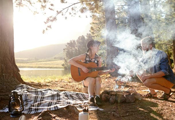 Couple, play and guitar at campfire outdoor with music performance, summer vacation and romantic getaway. Happy, people and instrument with travel, bonding together and creative talent of activity Couple, play and guitar at campfire outdoor with music performance, summer vacation and romantic getaway. Happy, people and instrument with travel, bonding together and creative talent of activity., model released, , 62974620.jpg RECORD DATE NOT STATED