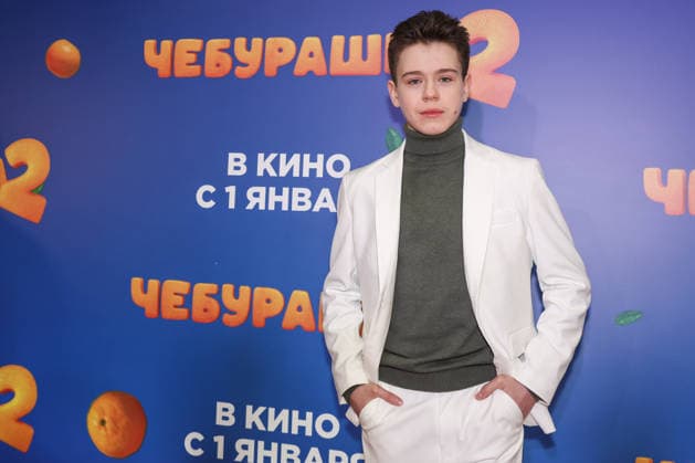 RUSSIA, MOSCOW - DECEMBER 24, 2025: Actor Mark Malik-Murashkin poses on the red carpet during the premiere of the family comedy Cheburashka 2 by Dmitry Dyachenko at the KARO 11 Oktyabr cinema on Novy Arbat Street (New Arbat Avenue). Valery Sharifulin TASS  86692611