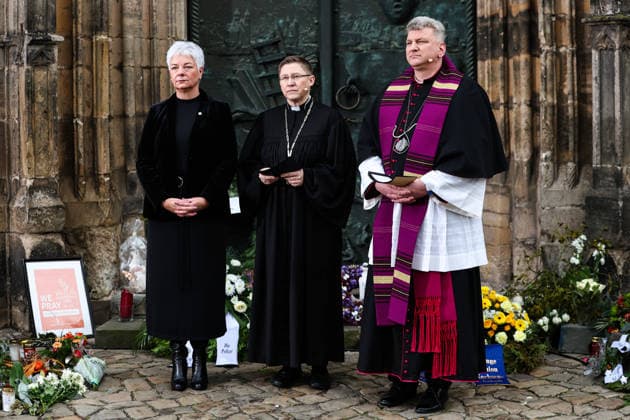Mayor Regina Dolores Stieler Hinz, Regional Bishop Bettina Schlauraff, Cathedral Pastor Daniel Rudloff stand in front of St. Johns Church at the memorial site Memorial event in Magdeburg Saxony Anhalt , Churches and the state capital invite you to a memorial service in