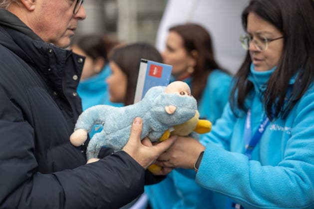 December 28, 2025, Madrid, Spain: A volunteer holds a stuffed animal during the fourth annual Solidarity Shower of Stuffed Animals . The event coincided with the Primera FEB (second tier of professional men s basketball in Spain) game between Movistar Estudiantes and Caja Rural CB Zamora. Attendees were able to exchange a new or gently used toy for a free ticket to the game. All the toys and stuffed animals collected were donated to the Madrina Foundation, which supports children, teenage mothers, and families at risk of social exclusion. Madrid Spain - ZUMAs197 20251228_aaa_s197_064 Copyright: xDavidxCanalesx