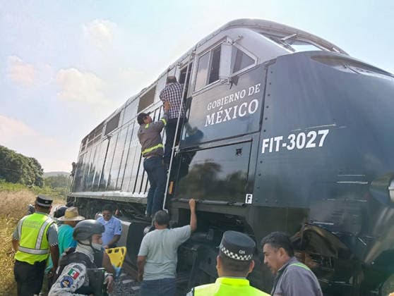 (251229) -- OAXACA, Dec. 29, 2025 -- This photo taken with a mobile phone on Dec. 28, 2025 shows the site of a train derailment accident in Municipality of Asuncion Ixtaltepec, State of Oaxaca, Mexico. A passenger train carrying 241 passengers and nine crew members derailed on a bridge near Nizanda in southern Mexico on Sunday, leaving at least 13 people dead and 98 others injured, the Secretariat of the Navy said on social media. The train plunged into a ravine while en route to the municipality of Matias Romero, according to Oaxaca Governor Salomon Jara. Authorities have launched a rescue operation using ropes and specialized equipment to evacuate those trapped inside a train car. (Str Xinhua) (SpotNews)MEXICO-OAXACA-TRAIN DERAILME 