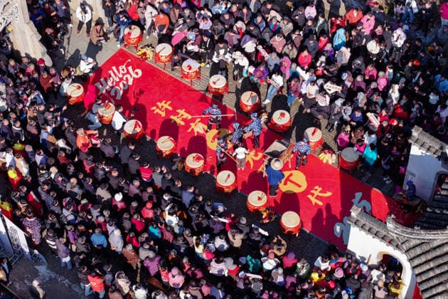 HUANGSHAN, CHINA - DECEMBER 28: Villagers walk on a catwalk during a village fashion show on December 28, 2025 in Shexian County, Huangshan City, Anhui Province of China. Nearly 200 villagers from 12 teams across Shexian County took center stage on the catwalk. They showcase various farming tools, agricultural products, cultural and tourism products through runway shows to greet the New Year.  Copyright: xVCGx 111612345882