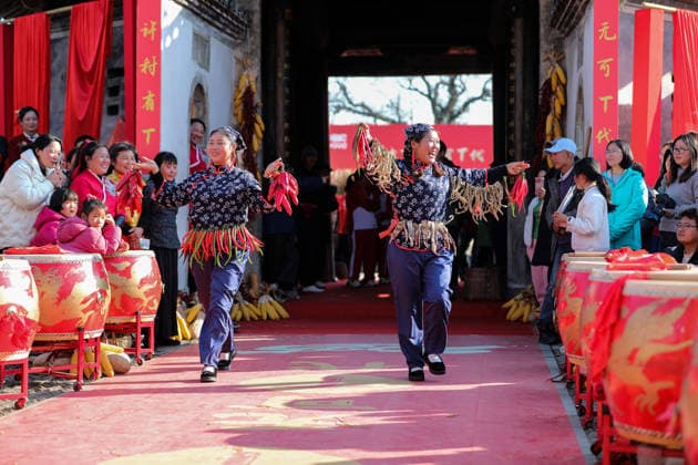 HUANGSHAN, CHINA - DECEMBER 28: Villagers walk on a catwalk during a village fashion show on December 28, 2025 in Shexian County, Huangshan City, Anhui Province of China. Nearly 200 villagers from 12 teams across Shexian County took center stage on the catwalk. They showcase various farming tools, agricultural products, cultural and tourism products through runway shows to greet the New Year.  Copyright: xVCGx 111612345887