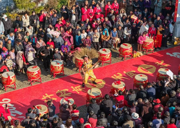 HUANGSHAN, CHINA - DECEMBER 28: A villager walks on a catwalk during a village fashion show on December 28, 2025 in Shexian County, Huangshan City, Anhui Province of China. Nearly 200 villagers from 12 teams across Shexian County took center stage on the catwalk. They showcase various farming tools, agricultural products, cultural and tourism products through runway shows to greet the New Year.  Copyright: xVCGx 111612350759