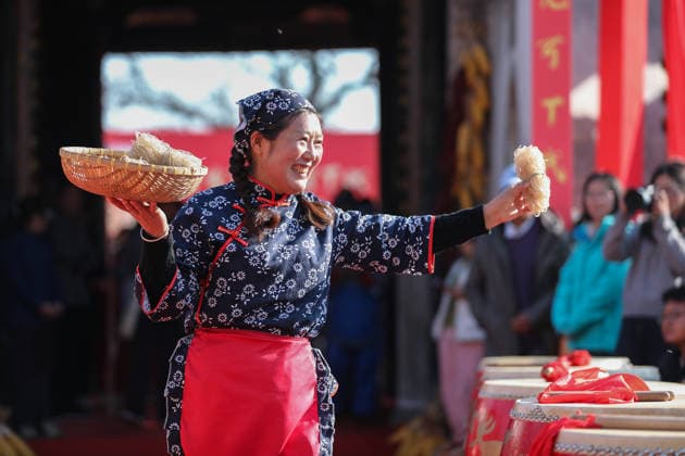 HUANGSHAN, CHINA - DECEMBER 28: A villager walks on a catwalk during a village fashion show on December 28, 2025 in Shexian County, Huangshan City, Anhui Province of China. Nearly 200 villagers from 12 teams across Shexian County took center stage on the catwalk. They showcase various farming tools, agricultural products, cultural and tourism products through runway shows to greet the New Year.  Copyright: xVCGx 111612345884