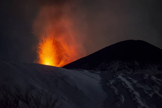 Mount Etna remains active after December 27 eruption CATANIA, ITALY - DECEMBER 29: Volcanic activity continues incessantly on Mount Etna after the paroxysmal activity of 27th December 2025 at the North-East Crater of Mount Etna, Catania, Italy on December 29, 2025. Although at a lower intensity, the explosions are continuous and rise a hundred metres above the crater rim. The flow of ash and steam continues, creating a permanent column above the summit craters that moves with the winds. The situation remains in evolution, and it has been reported that Catania International Airport remains open, but the Volcano Observatory Notices for Aviation alert level remains red due to possible changes in the volcano s activity and ash emissions into th  Copyright: x2025xAnadoluxSalvatorexAllegrax
