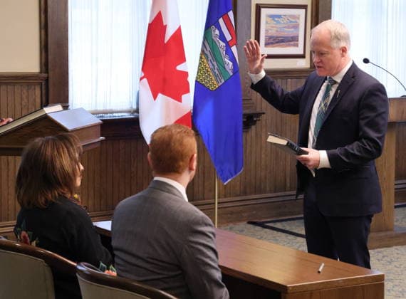 January 2, 2026, Calgary, Ab, Canada: Alberta Lt.-Gov. Salma Lakhani, left, swears-in MLA Grant Hunter as the new Minister of Environment and Protected Areas at McDougall Centre in Calgary on Friday, Jan. 2, 2026. Calgary Canada  - ZUMAc35_ 20260102_zaf_c35_003 Copyright: xGavinxYoungx