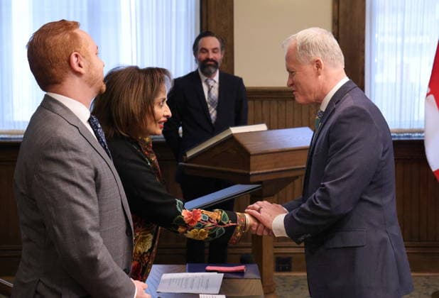 January 2, 2026, Calgary, Ab, Canada: Alberta Lt.-Gov. Salma Lakhani, shakes hands with MLA Grant Hunter, right, as he is sworn-in as the new Minister of Environment and Protected Areas at McDougall Centre in Calgary on Friday, Jan. 2, 2026. Calgary Canada  - ZUMAc35_ 20260102_zaf_c35_007 Copyright: xGavinxYoungx