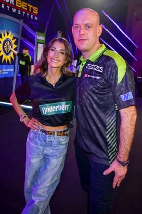 abb Catherine Cathy Hummels Darty presenter with Michael van Gerwen, participant in the Celebrity Darts World Championship on Pro Sieben at the Maritim Hotel on 04 01 2026 in Bonn NRW Germany