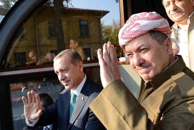 Turkish PM in Diyarbakir DIYARBAKIR, TURKEY - NOVEMBER 16: Turkish Prime Minister Recep Tayyip Erdogan (L) and The head of autonomous Kurdish government in Iraq s north Masoud Barzani (R) greet the people before a mass opening ceremony on November 16, 2013 in Diyarbakir, Turkey. Diyarbakir Turkey. Editorial use only. Please get in touch for any other usage.  Copyright: x2025xAnadoluxKayhanxÖzerx