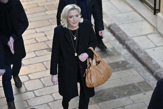 Marine Le Pen At Brigitte Bardot Funeral - Saint-Tropez President of French far right party Rassemblement National Marine Le Pen arriving at Notre-Dame de l Assomption church, for the funeral ceremony for late French actress Brigitte Bardot, in Saint-Tropez, southeastern France, on January 7, 2026. French film sensation Brigitte Bardot, a symbol of sexual liberation in the 1950s and 1960s who reinvented herself as an animal rights defender and embraced far-right views, died on Decmber 28, 2025 aged 91. Photo by Julien Reynaud APS-Medias ABACAPRESS.COM Saint-Tropez France  Copyright: xReynaudxJulien APS-Medias ABACAx