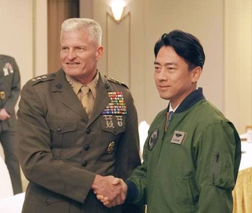 Japan defense minister in Okinawa Japanese Defense Minister Shinjiro Koizumi (R) shakes hands with Lt. Gen. Roger Turner, commanding general of the U.S. Marine Corps III Marine Expeditionary Force and Okinawa Area Coordinator, as they hold a meeting in Naha in Okinawa Prefecture, southern Japan, on Jan. 7, 2026.  A14AA0005161048P