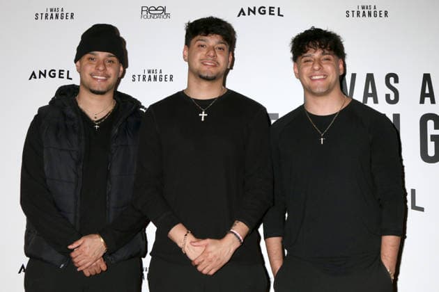 January 7, 2026, Century City, Ca, USA: LOS ANGELES - JAN 6: Joshua Jacob, John Morales, guest at I Was a Stranger Premiere at the AMC 15 Theaters on January 6, 2026 in Century City, CA Century City USA - ZUMAb170 20260107_aap_b170_011 Copyright: xKayxBlakex