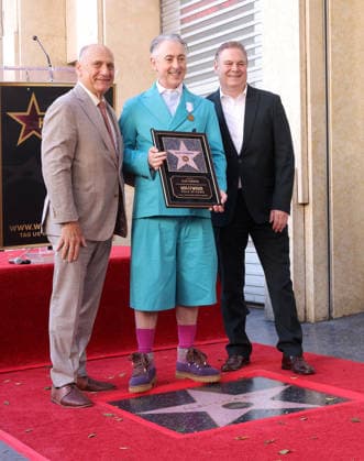 Steven Nissen, President & CEO, Hollywood Chamber of Commerce, Alan Cumming and Jerry Neuman, Executive Committee Member, Hollywood Chamber of Commerce attend an unveiling ceremony honoring Alan Cumming with the 2,832nd star on the Hollywood Walk of Fame in Los Angeles on Thursday, January 08, 2026.  LAP20260108894 GREGxGRUDT