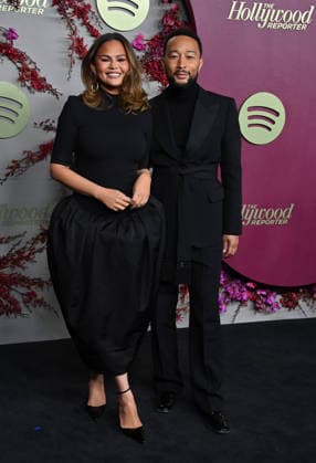 The Hollywood Reporter and Spotify Host Nominees Night Chrissy Teigen and John Legend arriving to The Hollywood Reporter And Spotify Host Nominees Night: An Official Golden Week Event held at The Lot at Formosa on January 8, 2026 in Los Angeles, Ca. Los Angeles The Lot at Formosa California USA Copyright: xTammiexArroyox xAFF-USA.comx