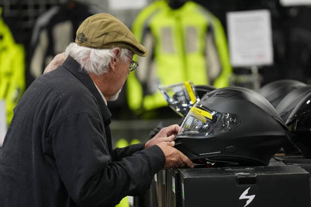 2026 North American International Motorcycle Supershow TORONTO, CANADA - JANUARY 9 : A man checks helmets at the 50th annual North American International Motorcycle Supershow at the International Centre in Mississauga, Ontario, Canada on January 9, 2026. Mert Alper Dervis Anadolu Ontario Canada. Editorial use only. Please get in touch for any other usage.  Copyright: x2026xAnadoluxMertxAlperxDervisx