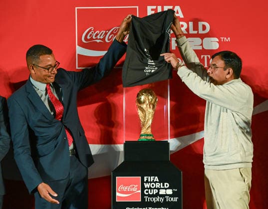 RECORD DATE NOT STATED Mansukh Mandaviya, Gilberto D™Silva unveil FIFA World Cup 2026 Trophy in New Delhi New Delhi, Jan 10 (ANI): Union Minister of Youth Affairs and Sports Mansukh Mandaviya and Brazilian footballer Gilberto D™Silva unveil the FIFA World Cup 2026 trophy during the FIFA World Cup 2026 trophy tour, in New Delhi on Saturday. New Delhi Delhi India Copyright: xANIx ANI_20260110318