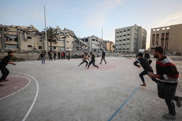 Displaced Palestinian youths play football on a destroyed pitch inside the devastated Islamic University in central Gaza City Displaced Palestinian youths play football on a destroyed pitch inside the devastated Islamic University in central Gaza City on January 10, 2026, trying to find moments of normalcy amidst the ongoing destruction and conflict in the Gaza Strip. Photo by Omar Ashtawy apaimages Gaza city Gaza Strip Palestinian Territory 100126_Gaza_OSH_00(19) Copyright: xapaimagesxOmarxAshtawyx xapaimagesx