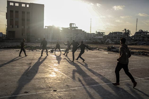 Displaced Palestinian youths play football on a destroyed pitch inside the devastated Islamic University in central Gaza City Displaced Palestinian youths play football on a destroyed pitch inside the devastated Islamic University in central Gaza City on January 10, 2026, trying to find moments of normalcy amidst the ongoing destruction and conflict in the Gaza Strip. Photo by Omar Ashtawy apaimages Gaza city Gaza Strip Palestinian Territory 100126_Gaza_OSH_00(2) Copyright: xapaimagesxOmarxAshtawyx xapaimagesx