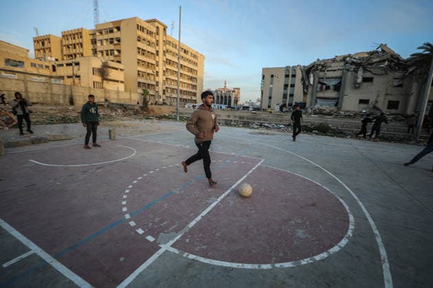 Displaced Palestinian youths play football on a destroyed pitch inside the devastated Islamic University in central Gaza City Displaced Palestinian youths play football on a destroyed pitch inside the devastated Islamic University in central Gaza City on January 10, 2026, trying to find moments of normalcy amidst the ongoing destruction and conflict in the Gaza Strip. Photo by Omar Ashtawy apaimages Gaza city Gaza Strip Palestinian Territory 100126_Gaza_OSH_00(20) Copyright: xapaimagesxOmarxAshtawyx xapaimagesx