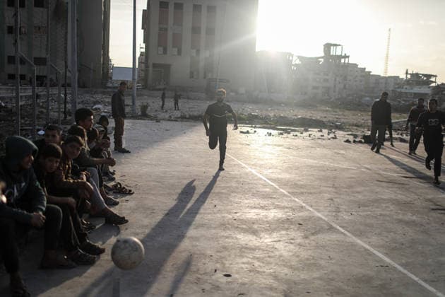 Displaced Palestinian youths play football on a destroyed pitch inside the devastated Islamic University in central Gaza City Displaced Palestinian youths play football on a destroyed pitch inside the devastated Islamic University in central Gaza City on January 10, 2026, trying to find moments of normalcy amidst the ongoing destruction and conflict in the Gaza Strip. Photo by Omar Ashtawy apaimages Gaza city Gaza Strip Palestinian Territory 100126_Gaza_OSH_00(3) Copyright: xapaimagesxOmarxAshtawyx xapaimagesx