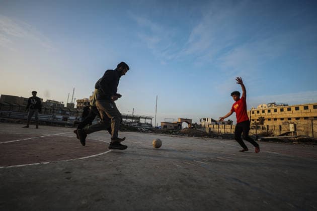 Displaced Palestinian youths play football on a destroyed pitch inside the devastated Islamic University in central Gaza City Displaced Palestinian youths play football on a destroyed pitch inside the devastated Islamic University in central Gaza City on January 10, 2026, trying to find moments of normalcy amidst the ongoing destruction and conflict in the Gaza Strip. Photo by Omar Ashtawy apaimages Gaza city Gaza Strip Palestinian Territory 100126_Gaza_OSH_00(15) Copyright: xapaimagesxOmarxAshtawyx xapaimagesx