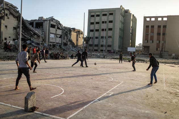 Displaced Palestinian youths play football on a destroyed pitch inside the devastated Islamic University in central Gaza City Displaced Palestinian youths play football on a destroyed pitch inside the devastated Islamic University in central Gaza City on January 10, 2026, trying to find moments of normalcy amidst the ongoing destruction and conflict in the Gaza Strip. Photo by Omar Ashtawy apaimages Gaza city Gaza Strip Palestinian Territory 100126_Gaza_OSH_00(5) Copyright: xapaimagesxOmarxAshtawyx xapaimagesx