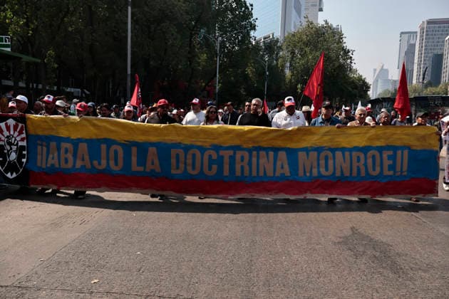 January 10, 2026, Mexico City, Cdmx, Mexico: Mexican protesters and social organizations are demonstrating against the actions of US President DONALD TRUMP against Venezuela and its former president, NICOLAS MADURO. With posters, giant banners, and Venezuelan flags, they are showing their support for MADURO and his vice president, DELCY RODRIGUEZ, who has assumed the presidency due to the country s situation. Chanting slogans like Yankees out of Latin America and Trump, imperialist terrorist, the protesters are demanding the immediate release of NICOLAS MADURO, whom they claim is being held captive by DONALD TRUMP. This comes as protests against these actions spread worldwide, with many believing TRUMP S true objective is to seize V - ZUMAp204 20260110_zip_p204_003 Copyright: xJosuexPerezx
