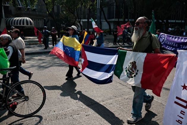 January 10, 2026, Mexico City, Cdmx, Mexico: Mexican protesters and social organizations are demonstrating against the actions of US President DONALD TRUMP against Venezuela and its former president, NICOLAS MADURO. With posters, giant banners, and Venezuelan flags, they are showing their support for MADURO and his vice president, DELCY RODRIGUEZ, who has assumed the presidency due to the country s situation. Chanting slogans like Yankees out of Latin America and Trump, imperialist terrorist, the protesters are demanding the immediate release of NICOLAS MADURO, whom they claim is being held captive by DONALD TRUMP. This comes as protests against these actions spread worldwide, with many believing TRUMP S true objective is to seize V - ZUMAp204 20260110_zip_p204_007 Copyright: xJosuexPerezx