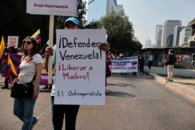 January 10, 2026, Mexico City, Cdmx, Mexico: Mexican protesters and social organizations are demonstrating against the actions of US President DONALD TRUMP against Venezuela and its former president, NICOLAS MADURO. With posters, giant banners, and Venezuelan flags, they are showing their support for MADURO and his vice president, DELCY RODRIGUEZ, who has assumed the presidency due to the country s situation. Chanting slogans like Yankees out of Latin America and Trump, imperialist terrorist, the protesters are demanding the immediate release of NICOLAS MADURO, whom they claim is being held captive by DONALD TRUMP. This comes as protests against these actions spread worldwide, with many believing TRUMP S true objective is to seize V - ZUMAp204 20260110_zip_p204_009 Copyright: xJosuexPerezx