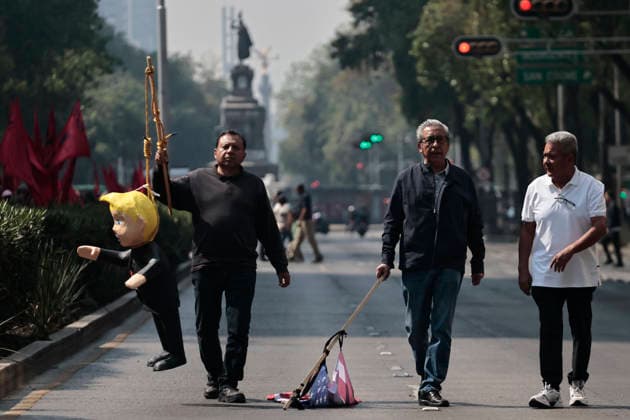January 10, 2026, Mexico City, Cdmx, Mexico: Mexican protesters and social organizations are demonstrating against the actions of US President DONALD TRUMP against Venezuela and its former president, NICOLAS MADURO. With posters, giant banners, and Venezuelan flags, they are showing their support for MADURO and his vice president, DELCY RODRIGUEZ, who has assumed the presidency due to the country s situation. Chanting slogans like Yankees out of Latin America and Trump, imperialist terrorist, the protesters are demanding the immediate release of NICOLAS MADURO, whom they claim is being held captive by DONALD TRUMP. This comes as protests against these actions spread worldwide, with many believing TRUMP S true objective is to seize V - ZUMAp204 20260110_zip_p204_027 Copyright: xJosuexPerezx